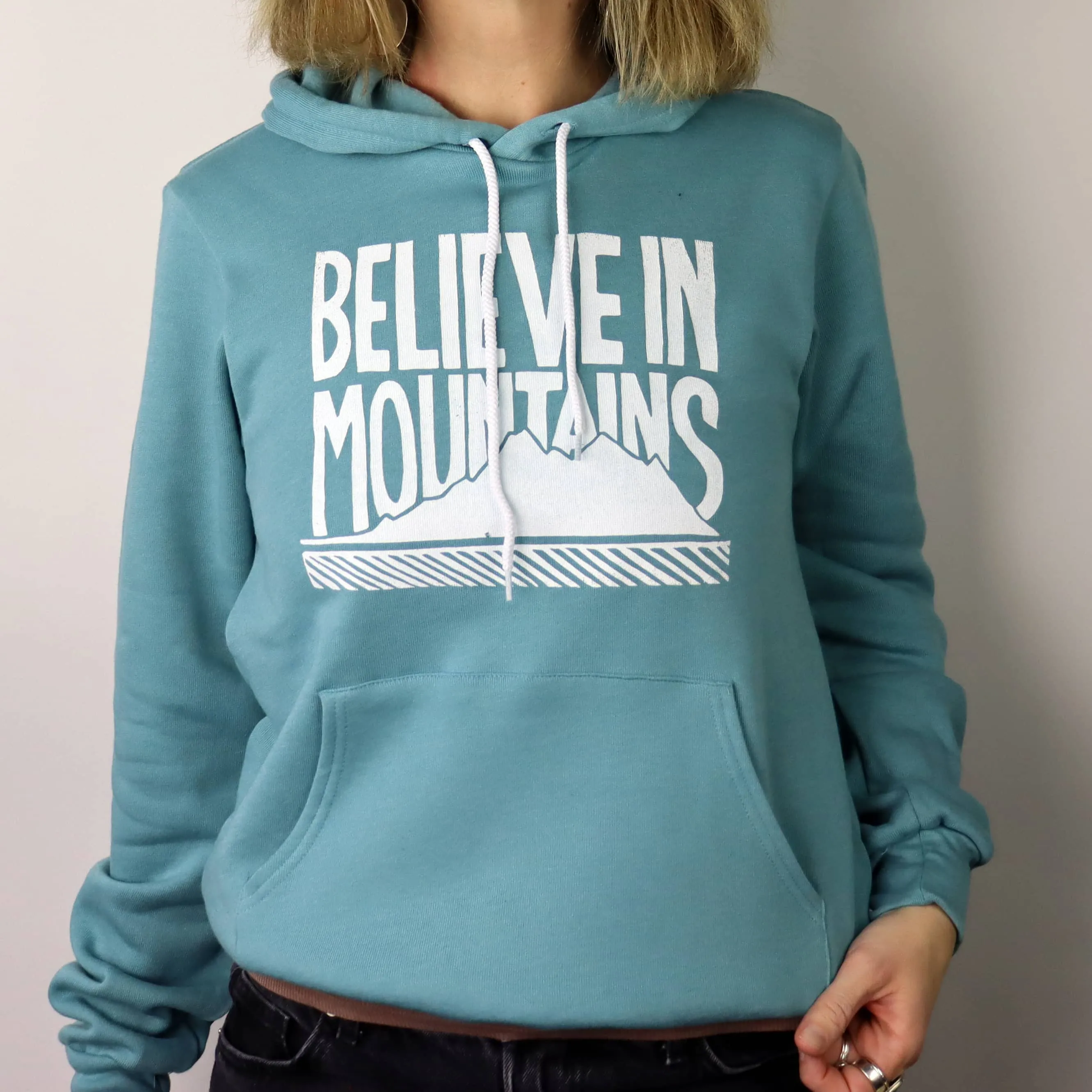 Believe in Mountains Unisex Pullover Hoodie in Glacier Blue