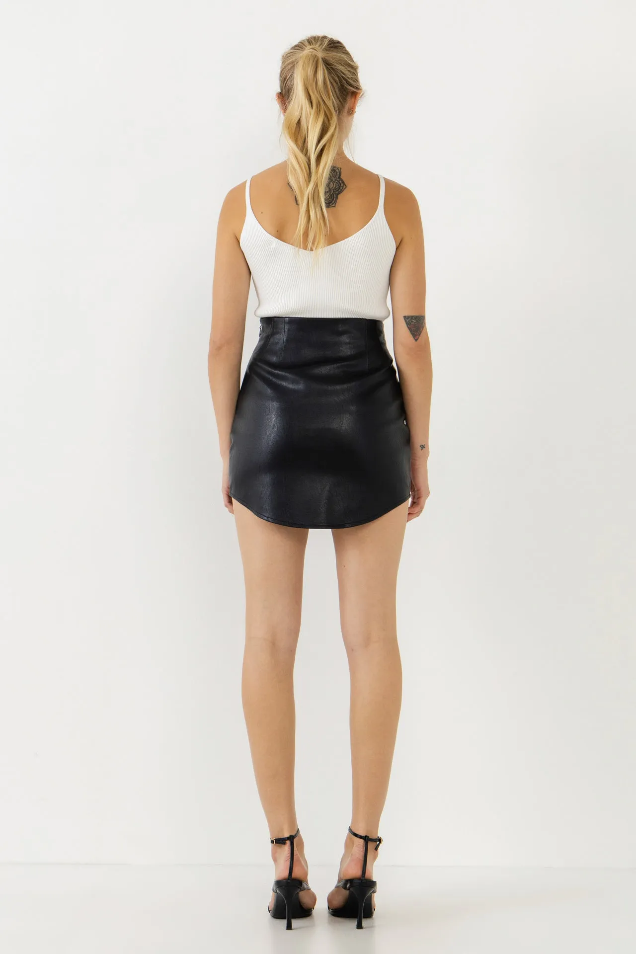 Curved Mini Pleather Skirt